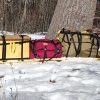 Voyageur, Coureur and Wanigan on a winter sled.