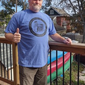 Odd man in nice T-shirt